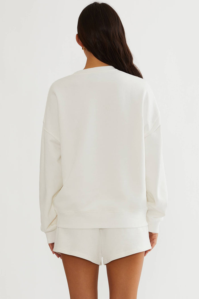 White sweatshirt with cherry " Ma cherie" text