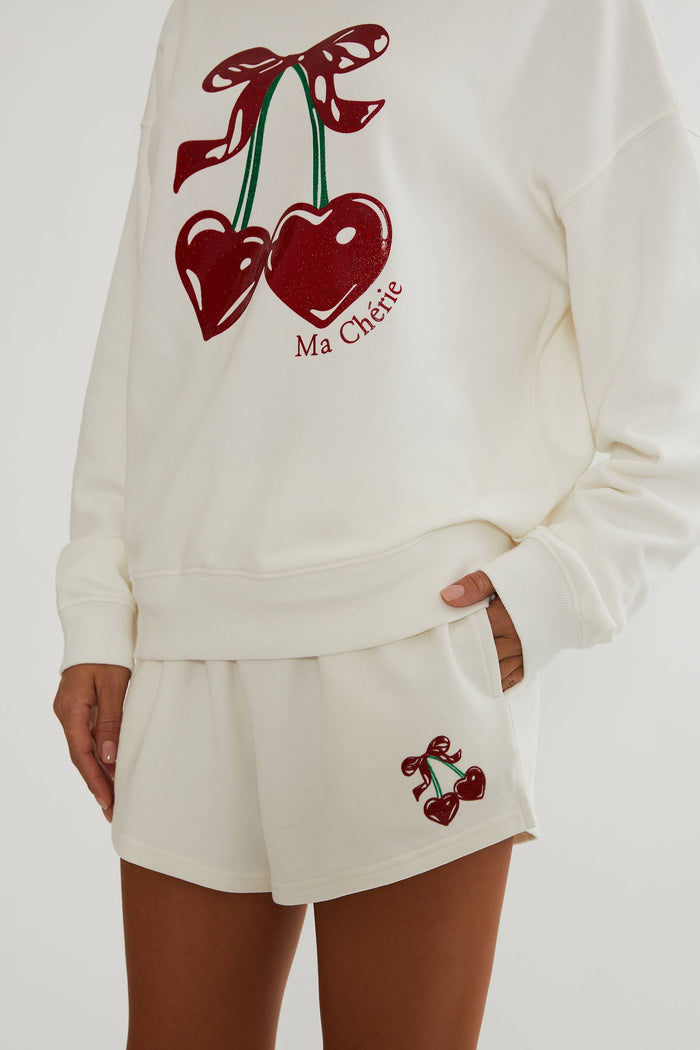 White sweat shorts with little glitter cherry design