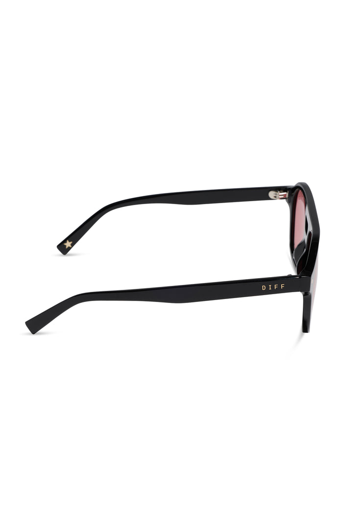 Black sunglasses with pink lenses on a white background