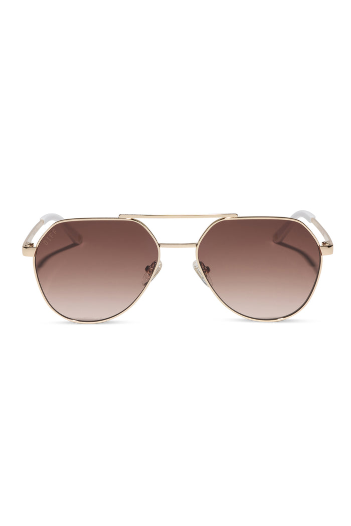 Gold-framed sunglasses with brown gradient lenses on a white background
