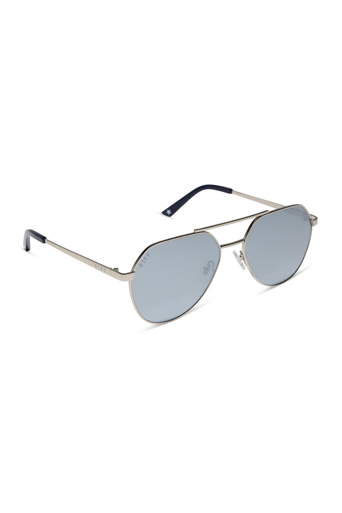 Sunglasses with blue gradient lenses and silver frame on a white background
