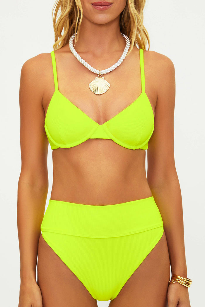 Neon green bikini set worn by a model on a white background