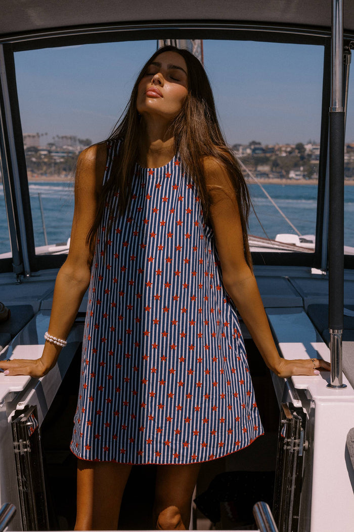 Tank linen dress with navy and white stripes and red stars.