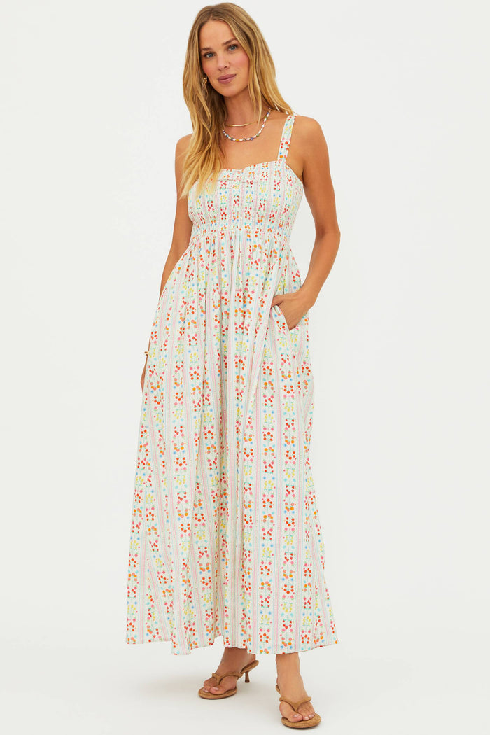 Woman wearing a floral dress on a white background