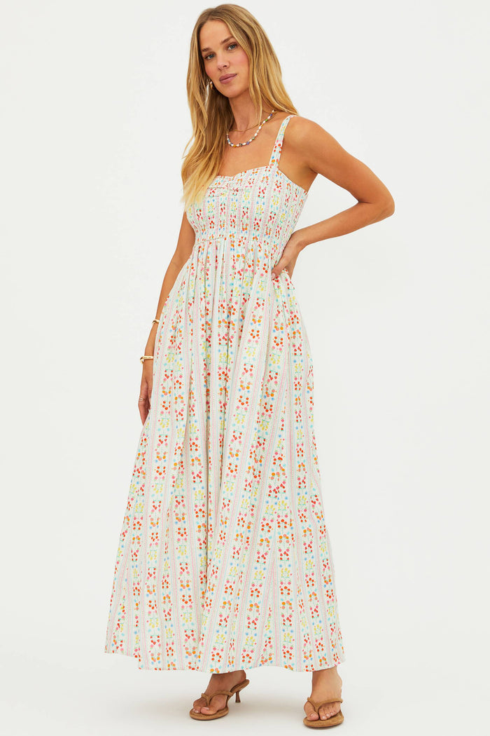 Woman wearing a floral dress on a white background