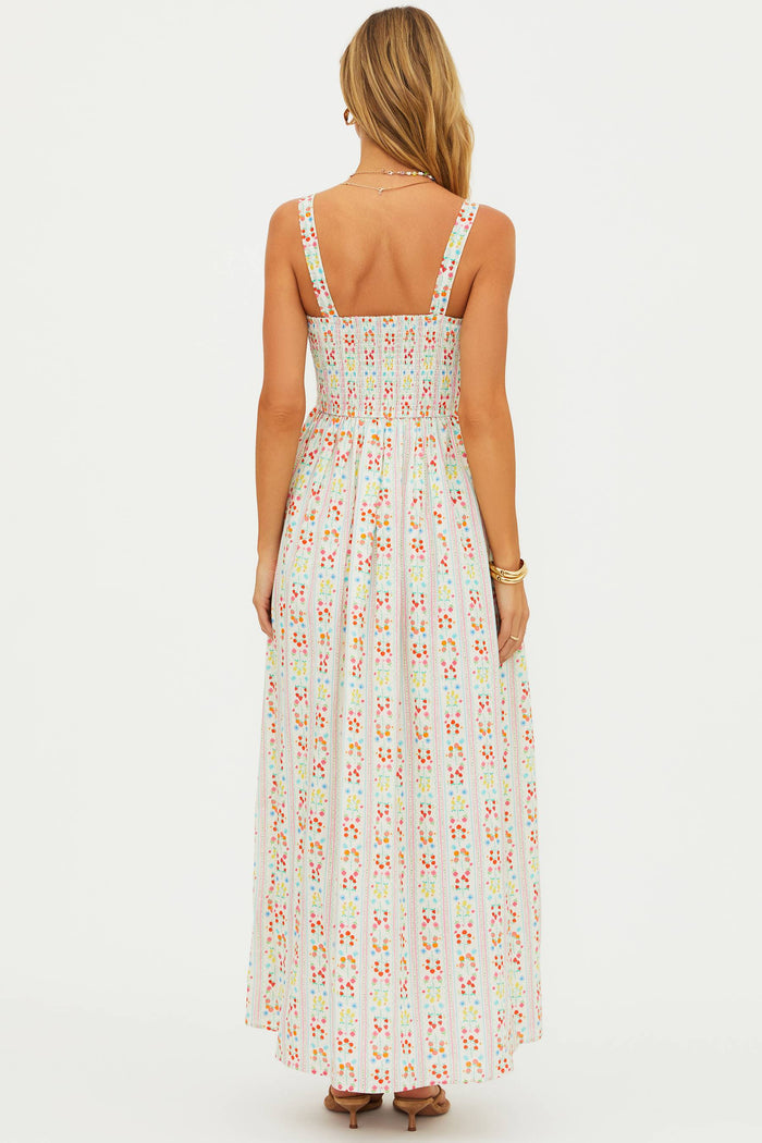 Woman wearing a floral dress on a white background