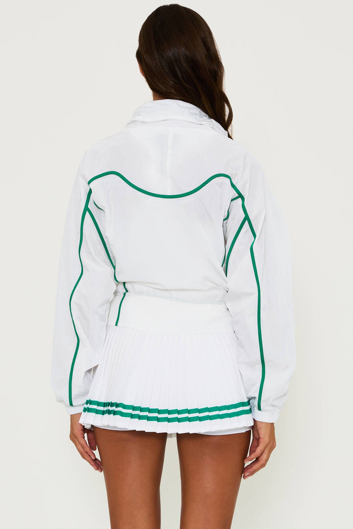 white running jacket with green piping detail