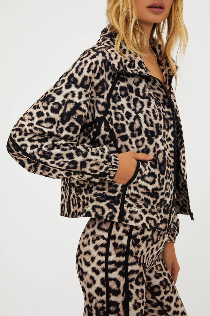 Leopard print outfit worn by a person on a white background