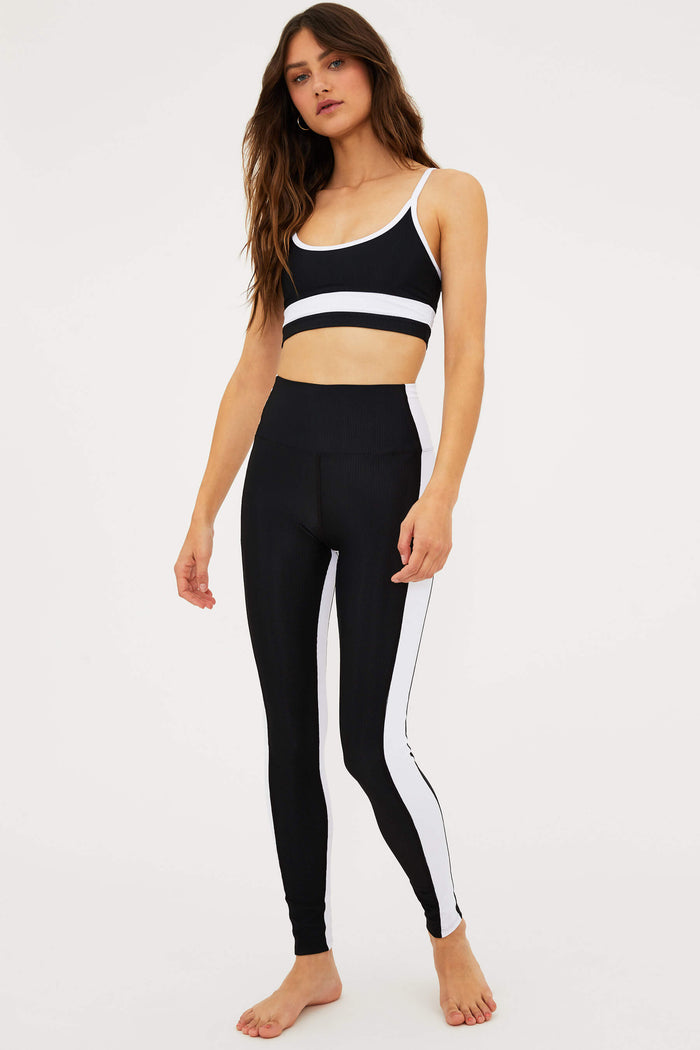 black full length legging with white panels on the side