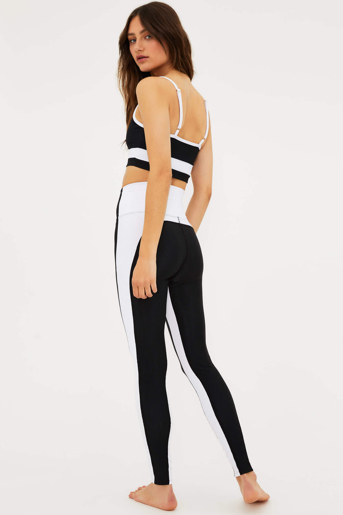 black full length legging with white panels on the side