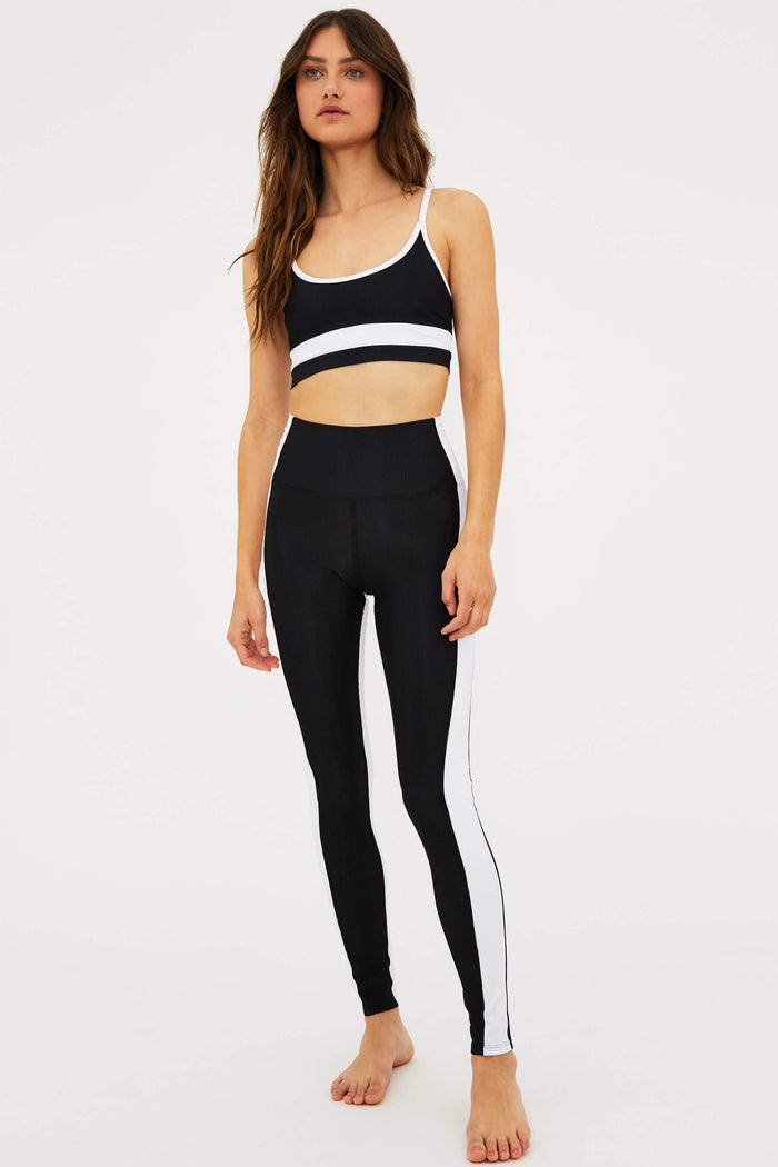 black full length legging with white panels on the side