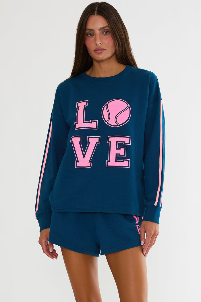 Navy sweatshirt with "Love" tennis text in pink.
