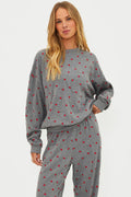 Grey sweatshirt with red hearts.