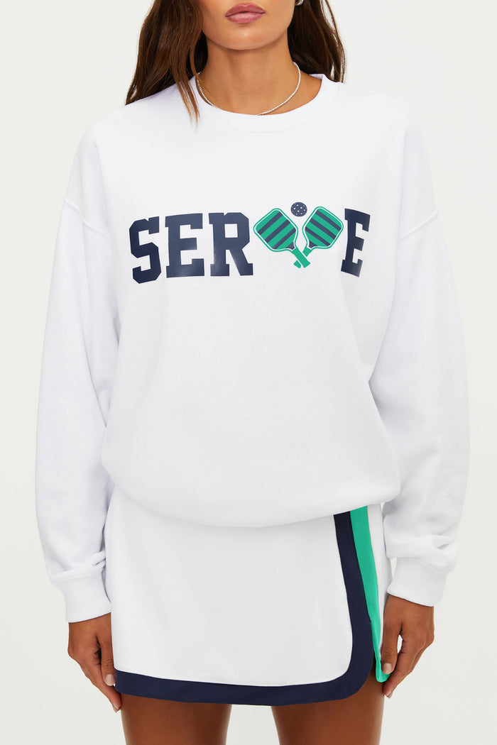 White sweatshirt with 'SERVE' text and tennis racket graphics on a white background