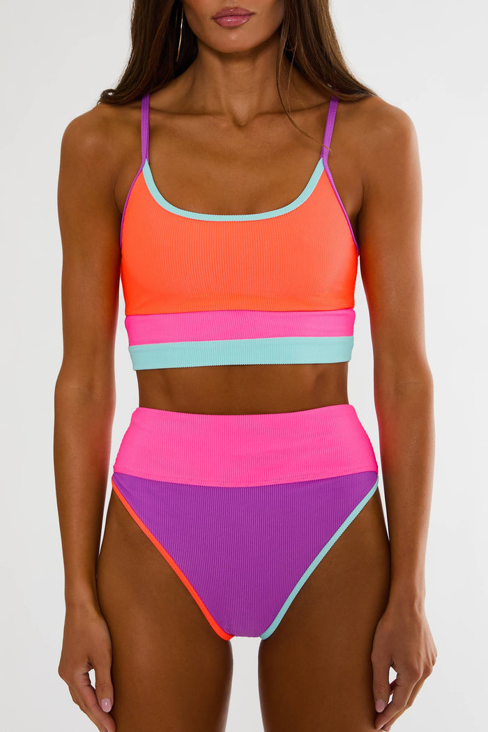 Colorful two-piece swimsuit with orange, pink, and purple design on a white background