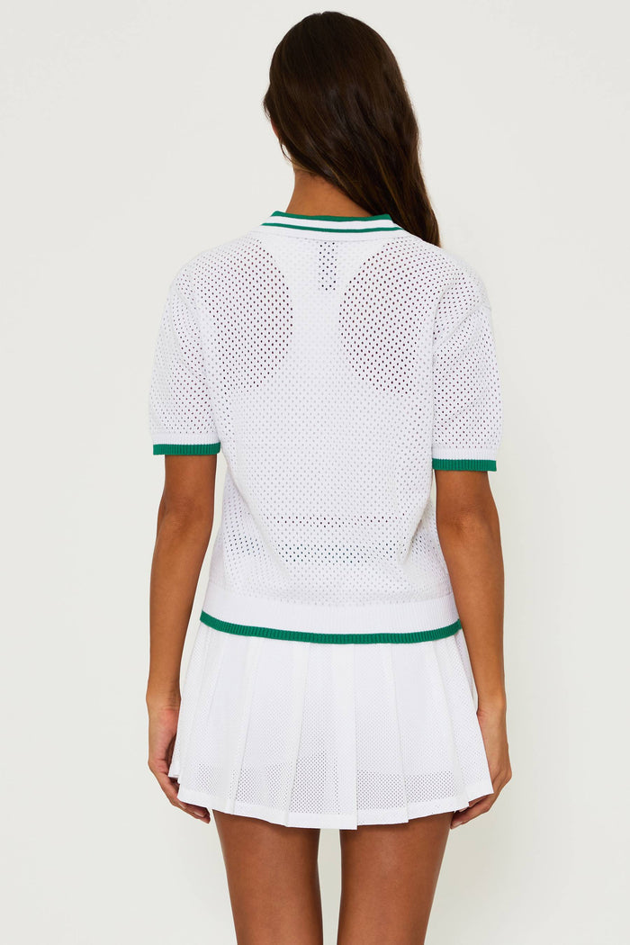 white mesh top with green contrast trim on the collar, cuffs and hem