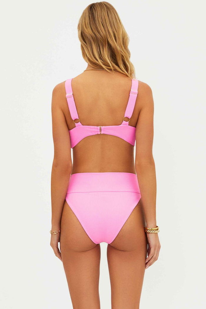 vibrant pink high waisted swim bottom with ribbed fabric