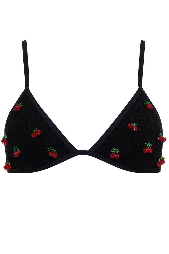 Black bra with red cherry embroidery on a white background