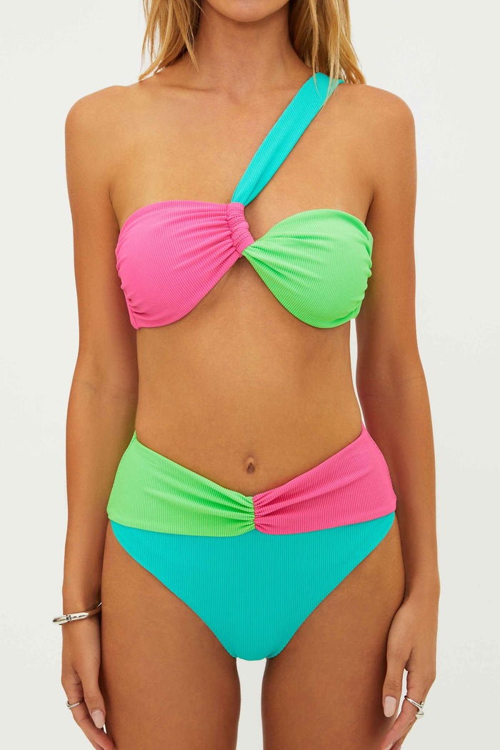 Colorful bikini with pink and green top and teal bottom on a white background