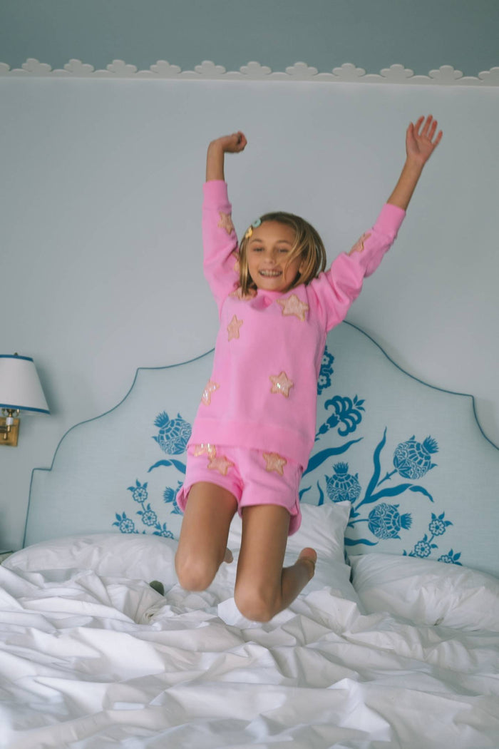 Pink short and sweatshirt with glitter stars