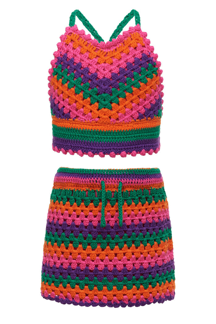 Young girl in a colorful crochet outfit