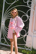 Pink robe with glitter stars