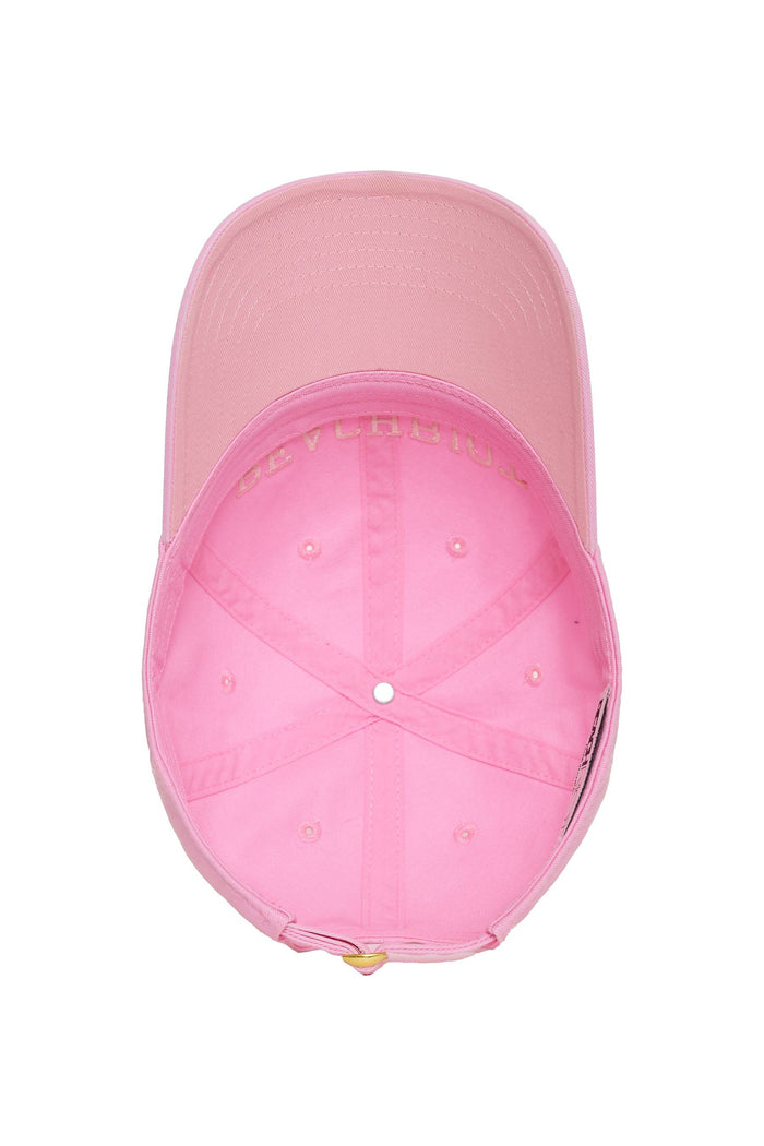 Pink cap on a white background