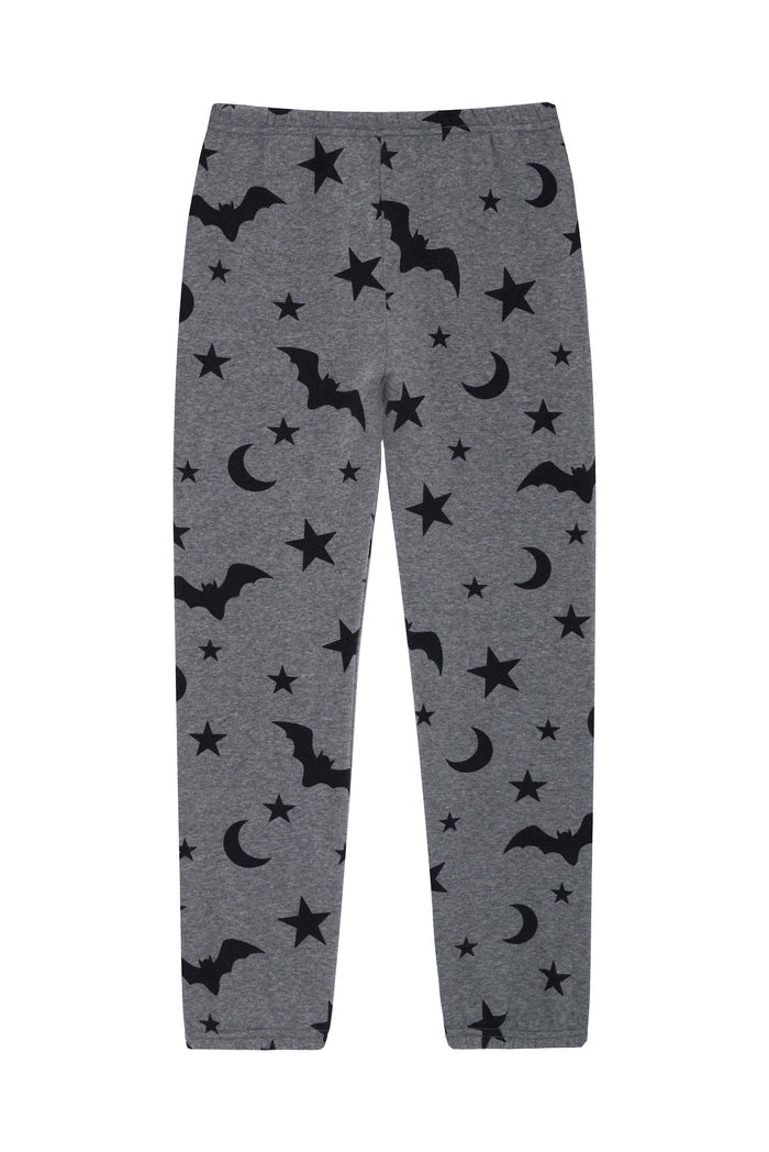 Kids grey sweatpants with black stars, moon, and bats.