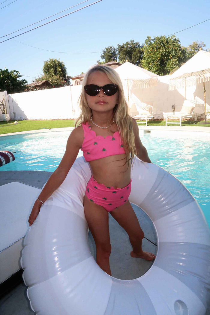 pink waffle fabric swimsuit with palm tree print