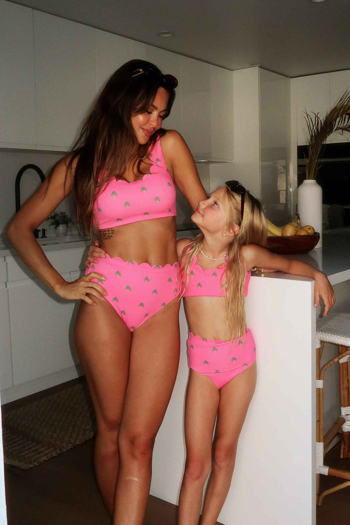 pink waffle fabric swimsuit with palm tree print