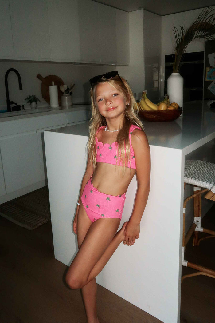pink waffle fabric swimsuit with palm tree print