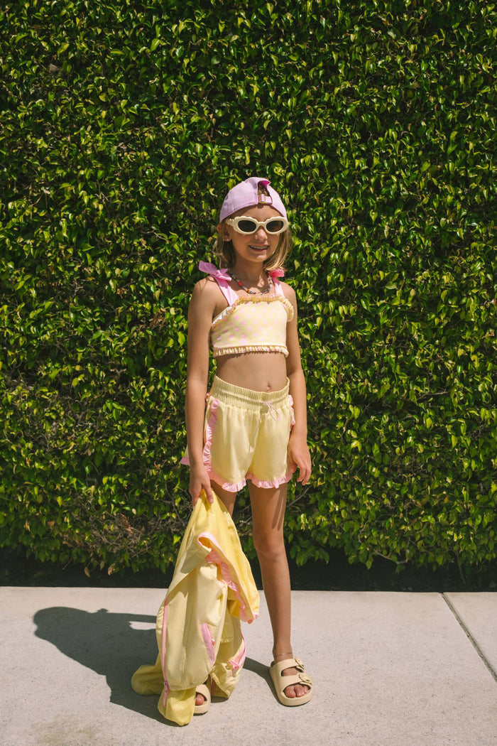 Yellow kids bikini with pink polka dots