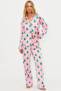 Pink pj set with green christmas trees