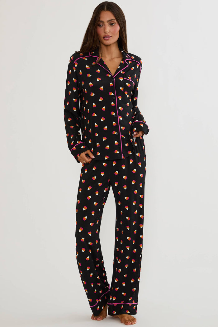 Long sleeve and pant pajama set with candy corns printed on.