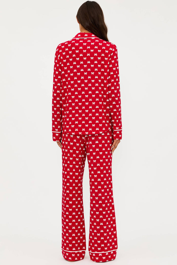 Red pajama set with white patterns on a white background