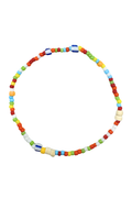 A colorful beaded necklace arranged in a circle on a plain white background. The necklace features small round beads in red, orange, yellow, green, blue, and white, with a few larger rectangular beads.
