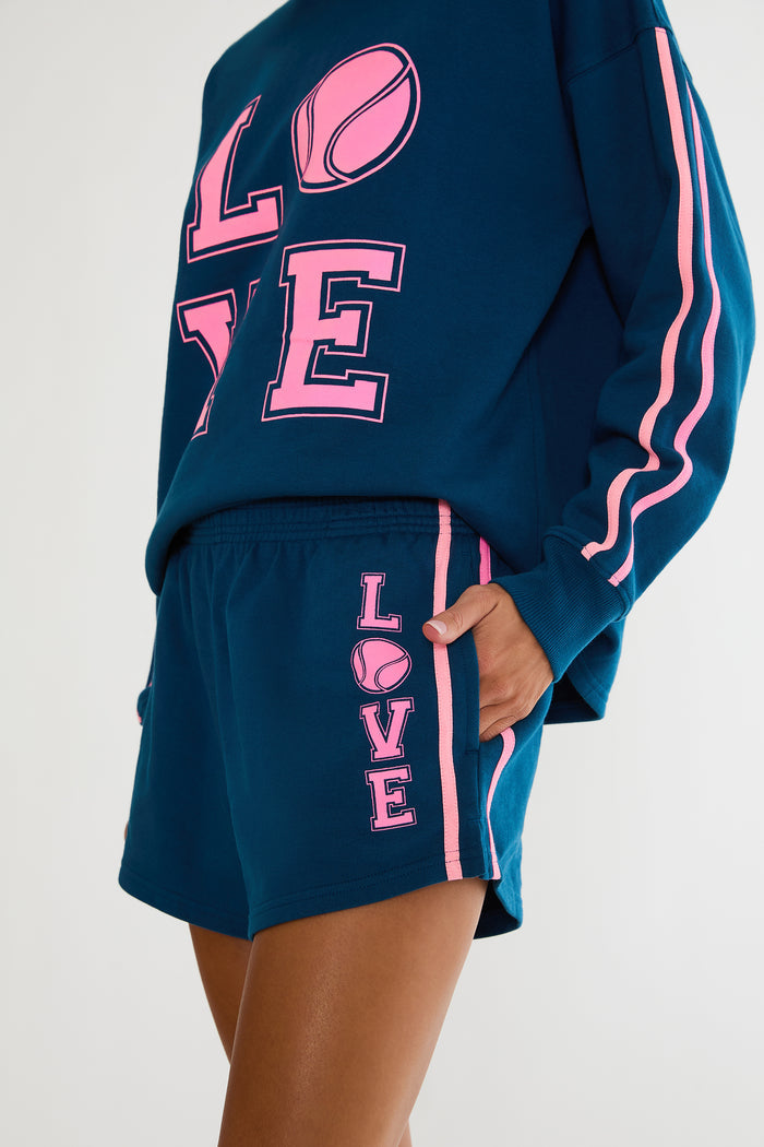 Navy sweat short with tennis pink design