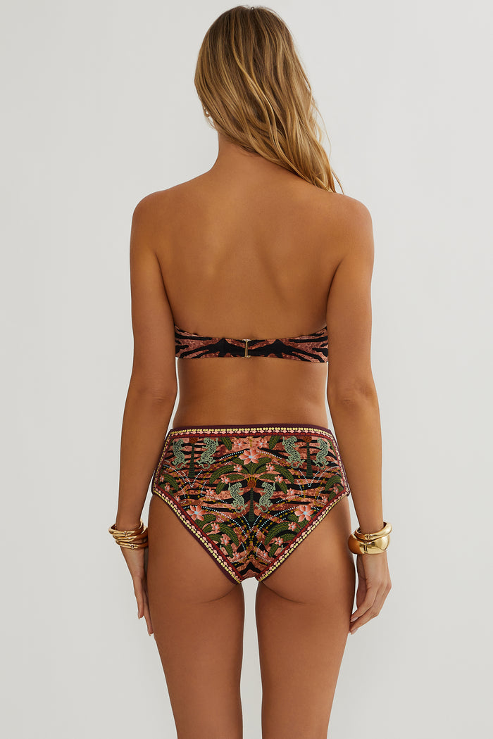 woman wearing a jungle print bikini