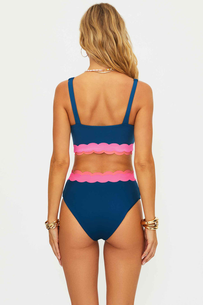Navy high waisted bikini bottom with pink scalloping around the waist