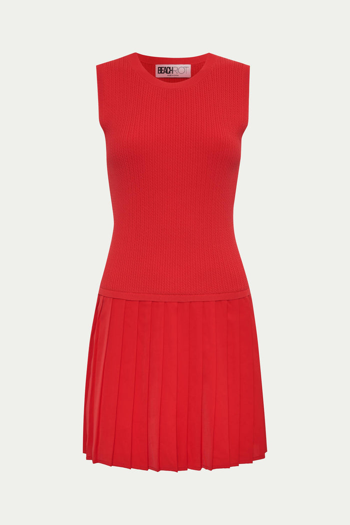 Woman wearing a red dress with white socks and red sneakers on a white background