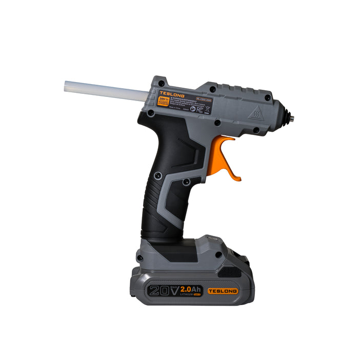 Black cordless hot glue gun with battery base on white background
