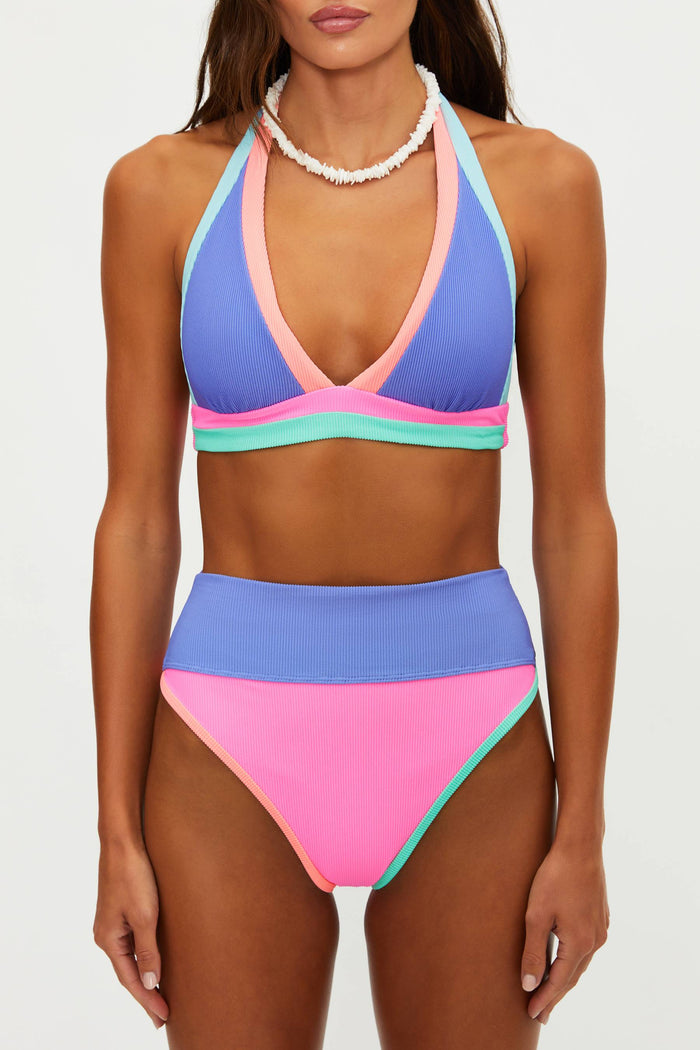 Colorful bikini set on a plain background