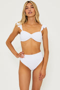white ribbed swim top with ruffled sleeve