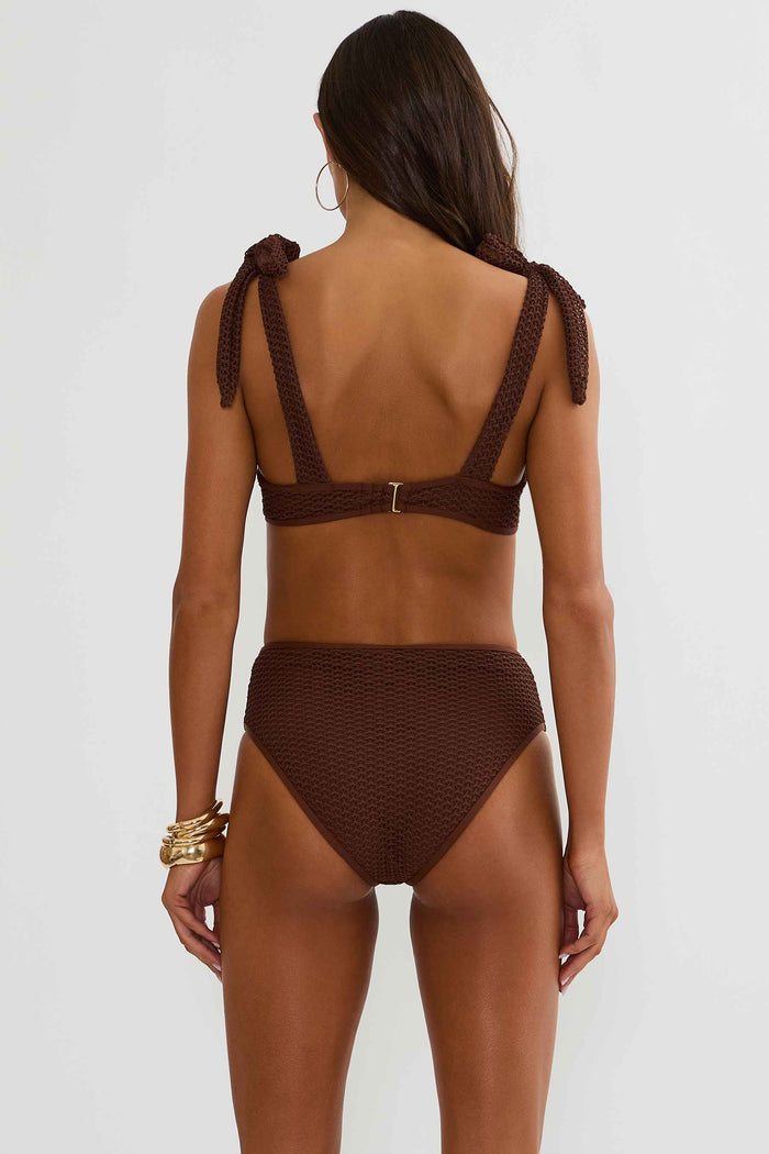 Brown bikini set with textured straps on a white background