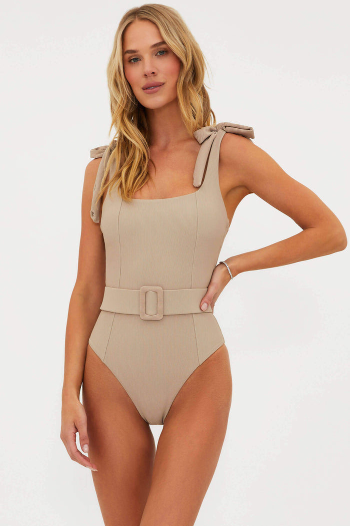 tan belted swim one piece with tie shoulder straps and ribbed fabric