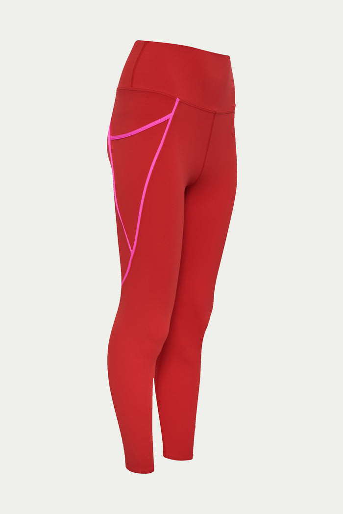 Red leggings with pink accents on a light gray background