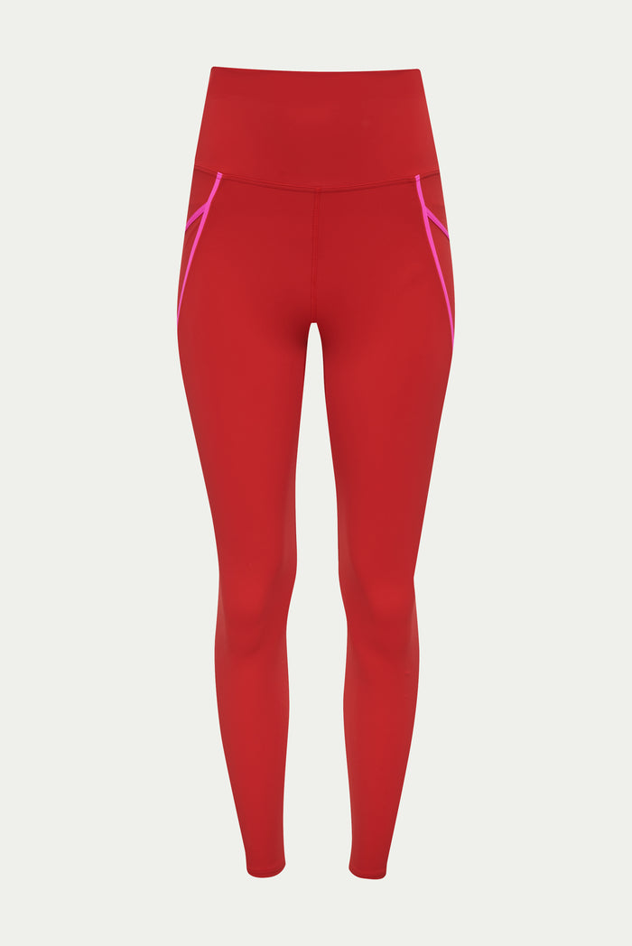 Red leggings with pink accents on a light gray background